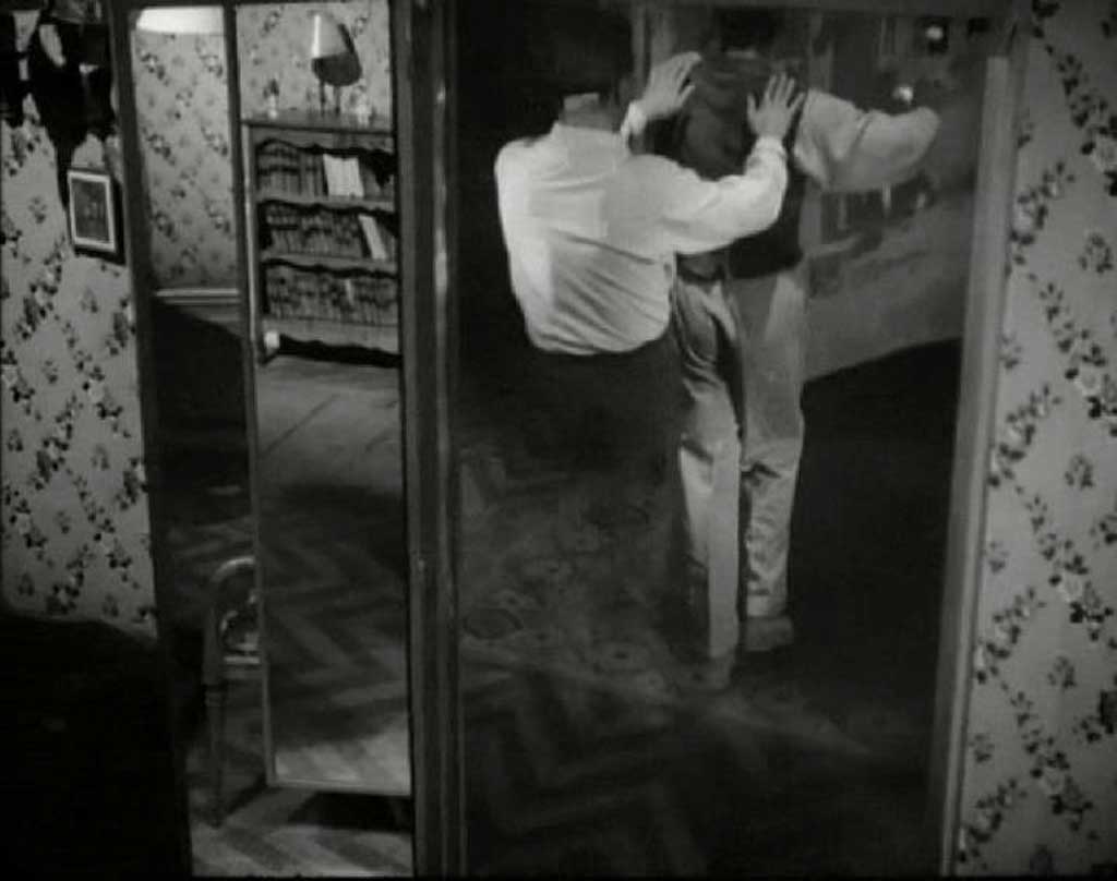 1949_cocteau_orphee-through-mirror_c.jpg